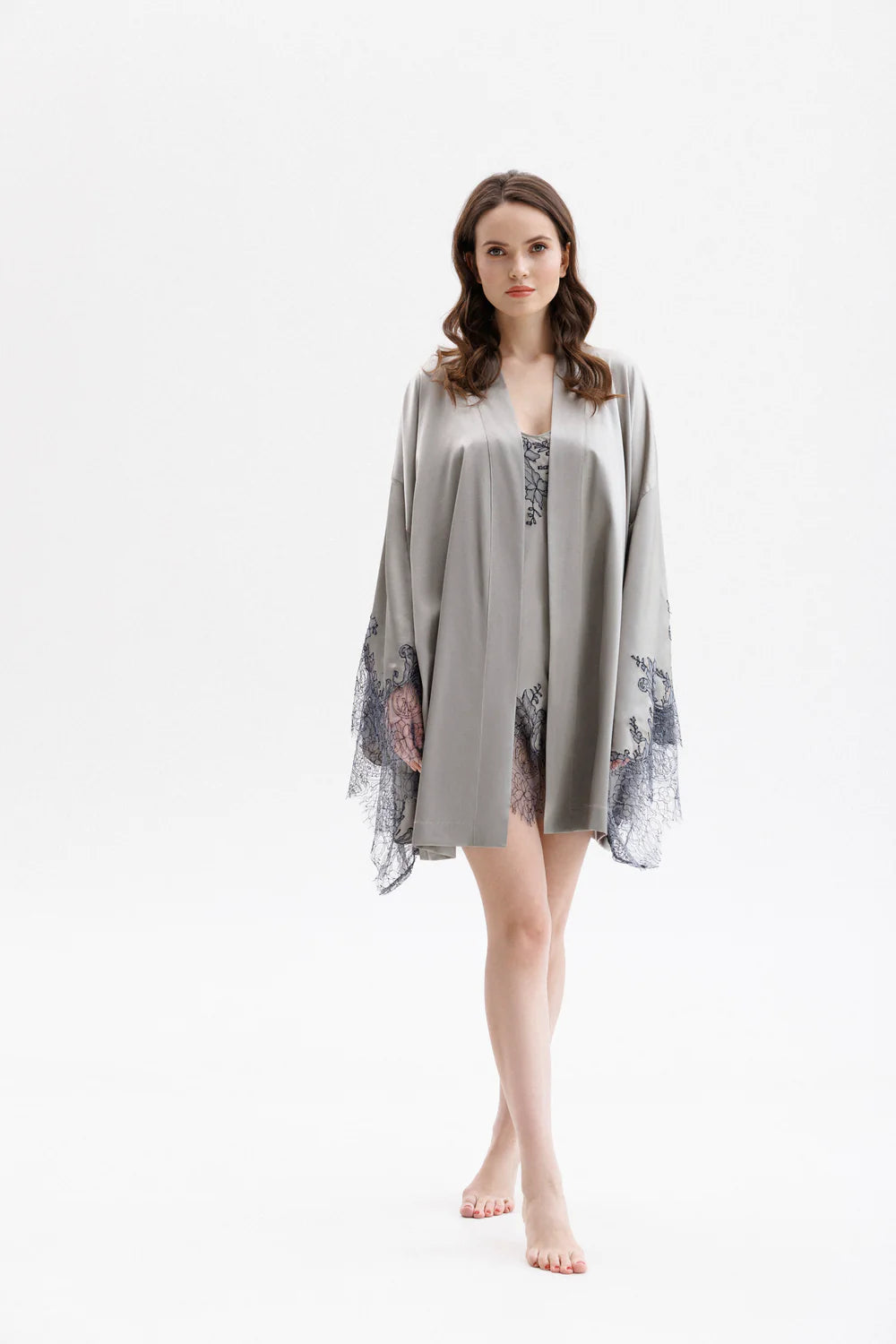 Woman wearing a gray silk robe with Leavers Lace sleeves with matching short negligee (sold separately)