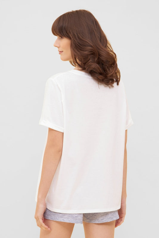 Women is wearing Be Happy Jersey Cotton Loose T-Shirt back picture with matching shorts (sold separately)