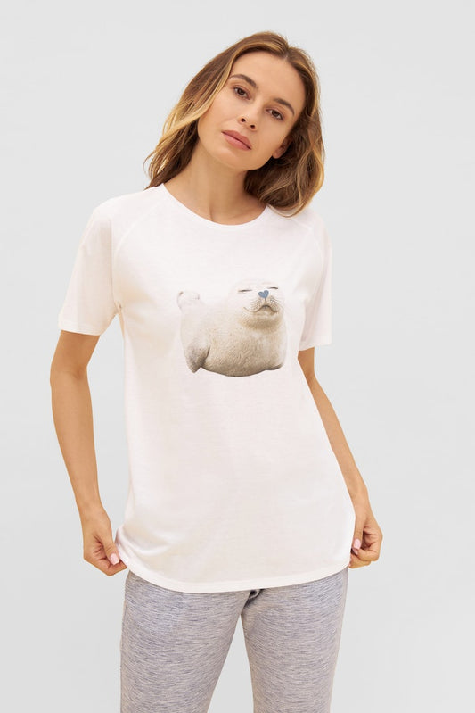 Women is wearing Be Happy Jersey Cotton Classic T-Shirt with seal print front picture with matching bottom ( sold separately)