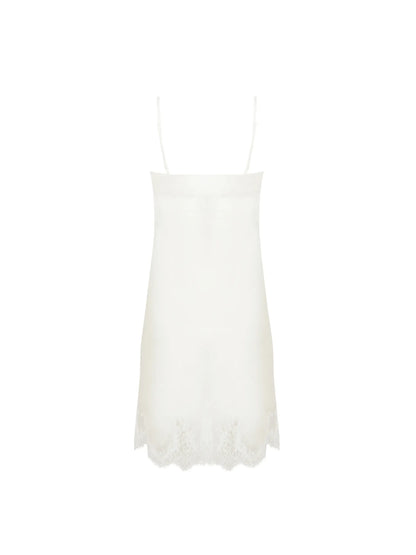 White lace-trimmed slip dress on a white background
